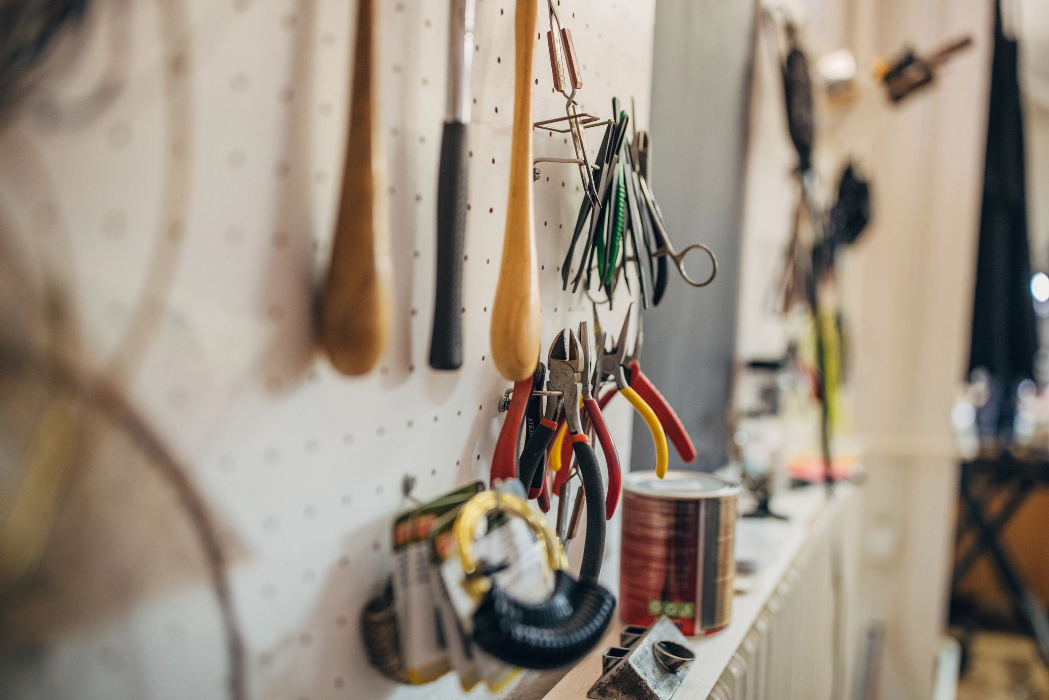 Organized wall of tools in a maker workspace